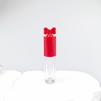 Tube à gloss vide personnalisable avec logo, multicolore, avec nœud décoratif et bouchon à vis, avec pinceau