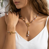Ensemble collier et bracelet pour femme avec perles de pierre naturelle facettées étanches, fermoir OT vibrant, pendentif pompon en perle naturelle