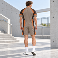 Ensemble 2 pièces personnalisé pour homme : T-shirt et short athlétiques en tissu tricoté performant avec empiècements contrastants pour le quotidien