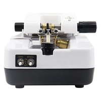 Machine de découpe et de rainurage de lentilles pour le traitement du verre des instruments optiques