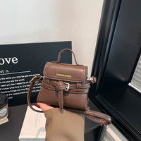 2026 Neue Trendige Bonbonfarbene Mädchen-Minihandtasche aus PU-Leder Modische Damen-Geldbörse Tragbare Frauen-Mini-Umhängetasche