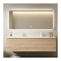 Ensemble complet de meubles de salle de bain en panneaux de particules : meuble sous-vasque, baignoire, toilettes