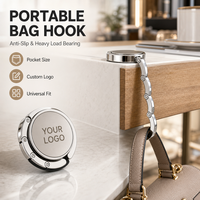 Crochet de table pliable circulaire en alliage de zinc avec logo personnalisé, sérigraphié, couleur personnalisée, logo personnalisé, plaqué argent, vente en gros