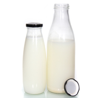 Bottiglia di vetro per l'imballaggio del latte frigorifero per bevande con porta in vetro bottiglie per il latte all'ingrosso bevanda in vetro