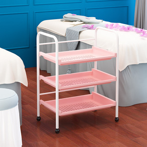 Chariot de beauté à trois niveaux, structure en plastique, 53x28x73cm, chariot de salon avec roulettes, design minimaliste pour manucure et coiffure - Product Image 1
