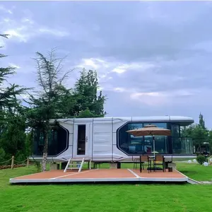 منزل جاهز حديث على شكل كبسولة فضائية متنقلة ذكية مصنوع من حاوية فولاذية