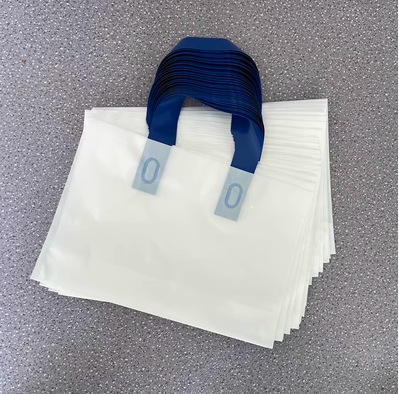 White with blue handle