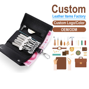 พวงกุญแจหนังวัวแท้คุณภาพสูงแบบขายส่ง พร้อมโลโก้สั่งทำได้  กระเป๋าใส่กุญแจอเนกประสงค์สำหรับทุกเพศ พร้อมช่องใส่เหรียญและห่วงคล้องกุญแจ - Product Image 1