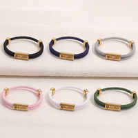 Bracelet anti-allergie en acier inoxydable avec barre gravée en or 18 carats et cordon en nylon double tressé pour hommes et femmes