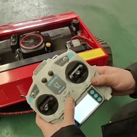 Remote Control Jarak Jauh 680m Berbahan Bakar Bensin Tipe Tracked 45 °   Mesin Pemotong Rumput Tugas Berat untuk Menaiki Lereng hingga 5.2 Mu/h dengan Pengisian Daya Otomatis