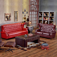 Canapé Chesterfield deux places en cuir microfibre sur mesure, dossier haut, pieds en bois massif, design moderne pour appartement et hôtel