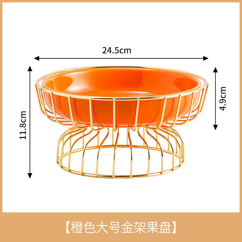 [Grande assiette de fruits orange] en fer forgé