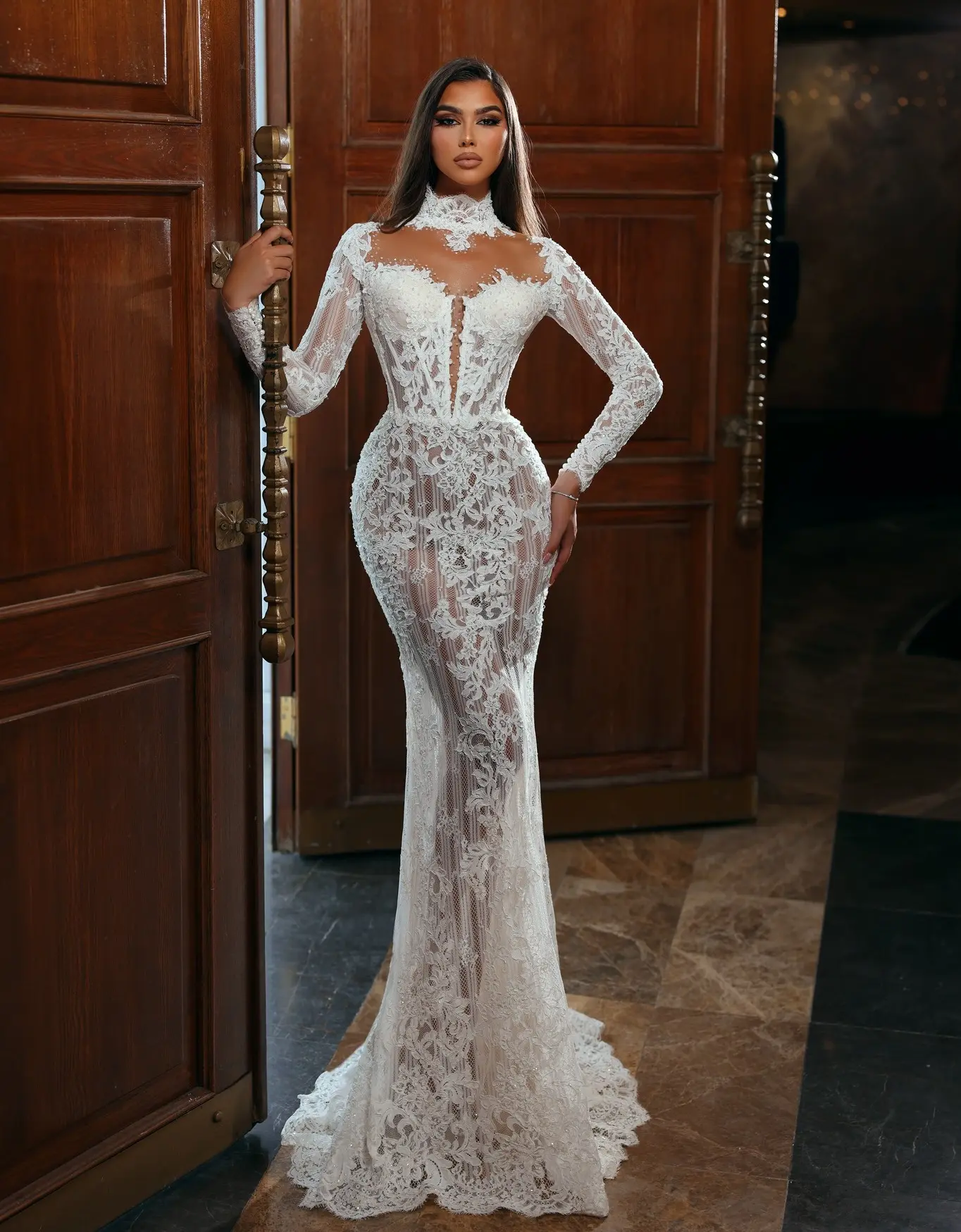 Hersteller individuelle Damen Spitzen Meerjungfrau Hochzeitskleid Designer Braut langärmelig sexy Illusionskleid