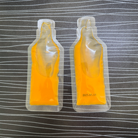 Machines de remplissage et d'emballage automatiques pour sachets en forme de bouteille de 15 ml (beurre, sauce soja, jus, eau pure, boissons) avec imprimante de date