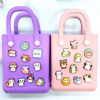 Décorations personnalisables de chaussures de chat de dessin animé mignon de concepteur PVC différentes couleurs en gros décorations de chaussures de chat pour les amoureux des animaux de compagnie