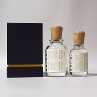 Bouteilles en verre d'emballage de parfum arabe personnalisé de Dubaï 30ml 50ml 100ml bouteille en verre d'huile de parfum de luxe avec couvercle en bois