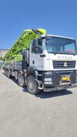 Camion pompe à béton Sitrak 70m d'occasion 2024, châssis à moteur diesel haute efficacité, en stock, prêt à être expédié