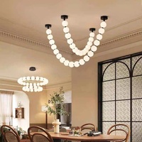 Lampe à suspension en boule noire de luxe postmoderne pour salon salle à manger escalier chambre à coucher Designer décoratif