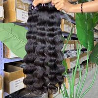 Vente en gros d'usine Vente en vrac Bundles de cheveux humains ondulés cambodgiens de qualité supérieure Bundles de cheveux humains naturels non traités