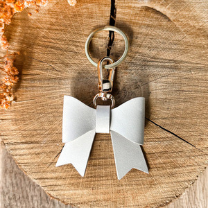 In stock, simple PU leather keychains, <b>bag</b> charms, sweet bow-shaped pendants, creative <b>key</b> <b>rings</b>. - Product Image 4