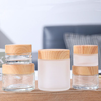 Pot cosmétique givré en verre de crème de visage de beurre corporel de l'usine chinoise personnalisé 5g 10g 15g 30g 50g 100g avec couvercle en bambou