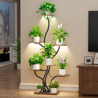 Support pour plantes de 65 pouces avec éclairage LED à spectre complet, étagère d'angle en bois et métal imperméable, capacité de 22 lb, étagère intérieure gain de place