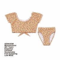 Op maat gemaakte kleurrijke privélabel bloemenprint tweedelige bikiniset met korte mouwen ODM fabriek kindersets tweedelige meisjes badpak