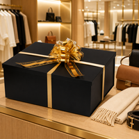 Boîte cadeau rigide de luxe noire mate grande et profonde avec ruban doré à nœud, emballages en carton pour vêtements et cadeaux d'entreprise