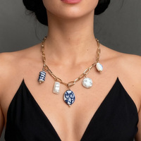Collier en chaîne avec pendentif en forme de cœur en imitation perle céramique, design unique, accessoire de style luxe léger