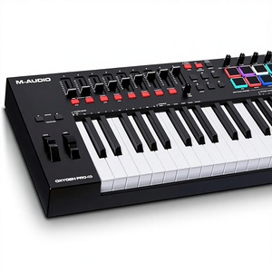 Clavier MIDI USB M-AUDIO Oxygen Pro 49 touches avec pads de rythme, boutons et faders programmables, son Native Instruments - Product Image 1