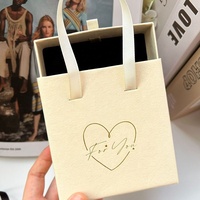 Valise de luxe au design personnalisé avec laminage mat gaufré, emballage cadeau en papier tendance et économique, marque OEM