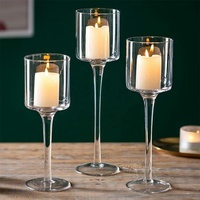 Bougeoir de pilier en verre de vin clair de luxe de longue tige pour la décoration de mariage