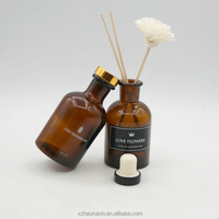 Vente en gros Bouteille vide ronde de luxe avec diffuseur d'arôme en verre ambré 125ml 250ml