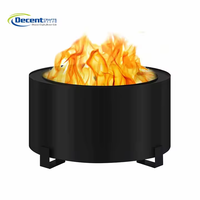 Perapian kayu bakar portabel bundar warna hitam matte untuk luar ruangan dengan tiga kaki logam berbentuk L, desain minimalis untuk teras.