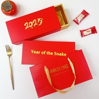 Boîte cadeau du Nouvel An 2025 en carton ondulé croustillant motif flocon de neige nougat serpent avec design fleur de pêcher, en matériaux recyclés, boîtes à fentes