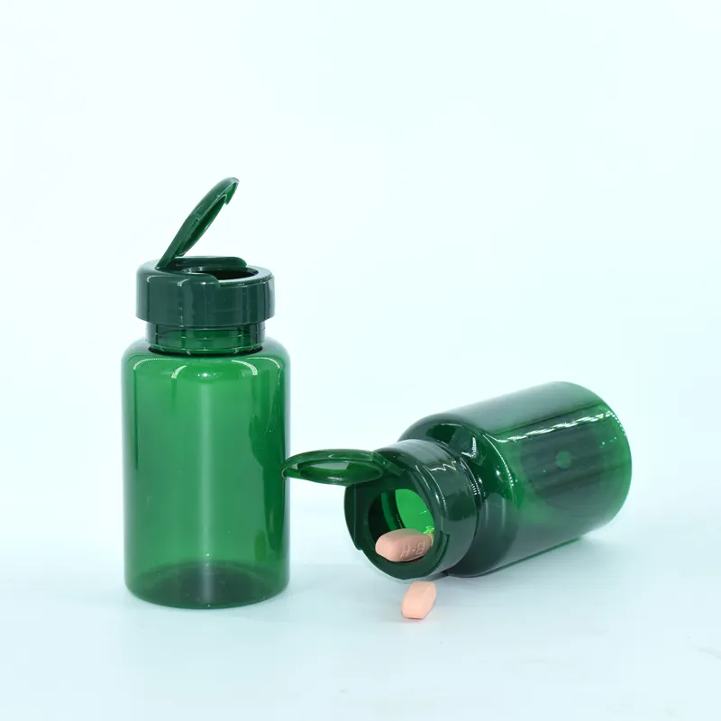 Verde 120cc En Stock Botella de medicina PET Vacío 150cc 200cc Cápsula Tarro de almacenamiento con tapa abatible Tapa de rosca farmacéutica de plástico