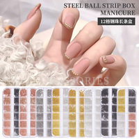 Nouveaux accessoires pour ongles transfrontaliers petites perles en acier dans une boîte longue à 12 grilles ensemble de clous en métal doré et argenté