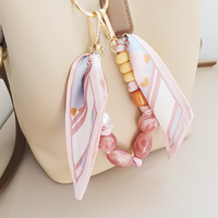Chaîne de téléphone en acrylique premium, style foulard, avec pendentif à perles irrégulières vintage, breloque pour sac et téléphone, porte-clés de voiture, élégant pour femme de bureau