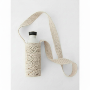 Porte-bouteilles en jonc de mer tissé écologique avec un accessoire de maison haut de gamme au design animal unique, parfait pour les anniversaires - Product Image 1
