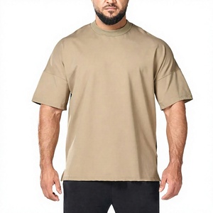 T-shirt blanc surdimensionné pour homme 100 % coton, col rond, manches courtes, logo frontal, style minimaliste uni, coupe ample, tricot jersey, couleur unie - Product Image 1