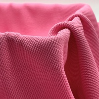 Tejido de punto jacquard de una sola cara teñido con hilo, 100% poliéster elástico y arrugado para trajes de baño de mujer