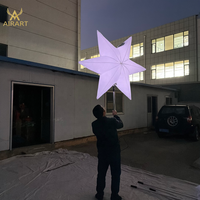 Marionnette gonflable lumineuse en forme d'étoile pour les activités commerciales, les fêtes, les défilés
