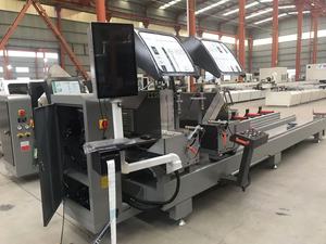 เครื่องเลื่อยตัดอลูมิเนียม CNC 550 แบบสองหัว พร้อมเครื่องยนต์และมอเตอร์กำลังไฟ 2x3 กิโลวัตต์ สำหรับการผลิตหน้าต่างและประตู - Product Image 4