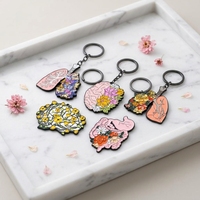 Porte-clés personnalisé en alliage de zinc, motif dessin animé créatif, fleur et papillon, vente en gros, pendentif artistique tendance pour sac ou cadeau