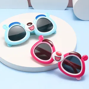 FANXUN83020 Óculos de sol unissex para crianças, óculos de proteção com lentes polarizadoras de silicone macio com desenho de urso marrom, proteção UV400 Tac