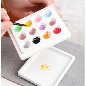 <span class=keywords><strong>Palette</strong></span> de <span class=keywords><strong>peinture</strong></span> en <span class=keywords><strong>porcelaine</strong></span> de forme carrée de 12 puits avec la <span class=keywords><strong>palette</strong></span> de <span class=keywords><strong>peinture</strong></span> en céramique blanche lavable de couverture pour le mélange de <span class=keywords><strong>peinture</strong></span> utilisant - Product Image 4