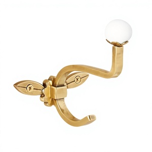 Gancho de Pared Color Latón Vintage con Bola de Cerámica Blanca, Resistente al Óxido, Perchero para Ropa - Product Image 1