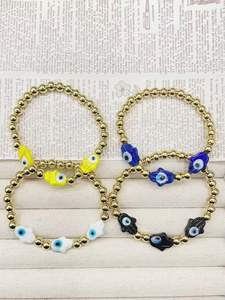 Bracciale Unisex in Cristallo Fatto a Mano Stile Bohemien Placcato Oro con Perline, Occhi di Nazar e Design Multicolore - Product Image 2