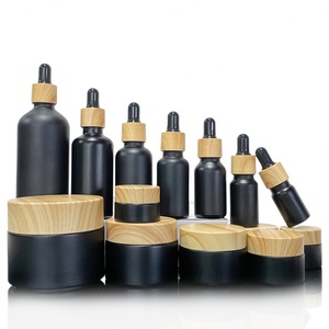 Pot en verre givré noir mat pour cosmétiques avec couvercle en bambou, contenants en verre avec dessus en grain de bois, 5g, 10g, 15g, 20g, 30g, 50g, 100g - Product Image 3