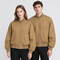 Blouson Bomber Unisexe Hydrofuge Col Montant Fermeture Éclair Manches et Ourlet Côtelés Coupe Ample Vêtement d'Extérieur Décontracté Vente en Gros